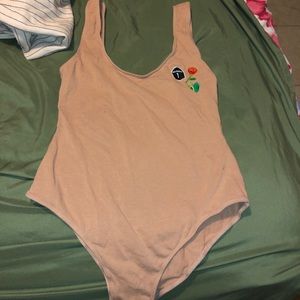 Tan body suit
